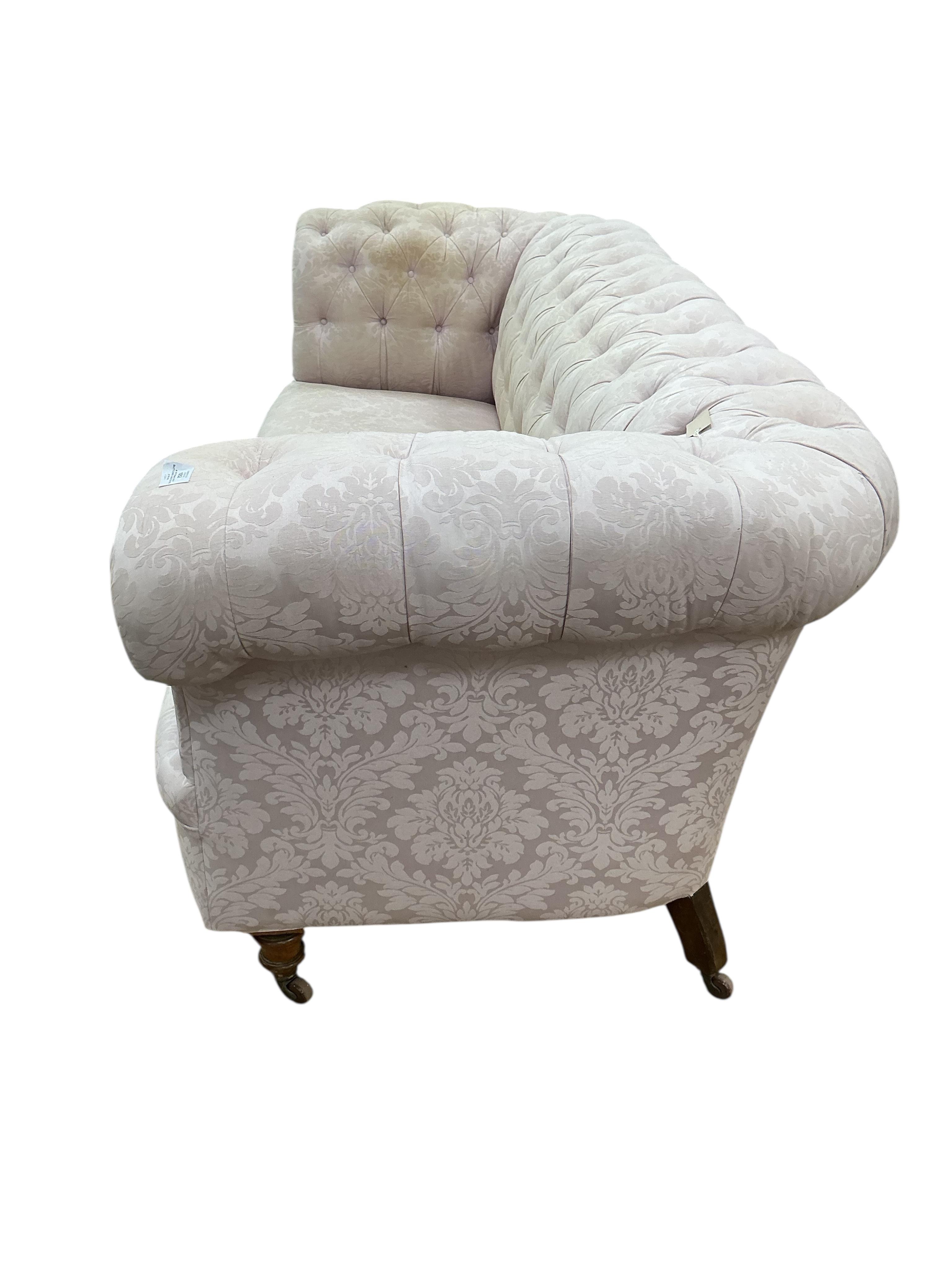 A Victorian deep buttoned Chesterfield settee, width 236cm, depth 91cm, height 84cm